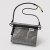 Ultralight Dyneema zip pouch worn as crossbody bag