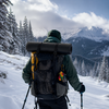 Black IXPE closed cell foam ground pad strapped to backpack for winter hiking