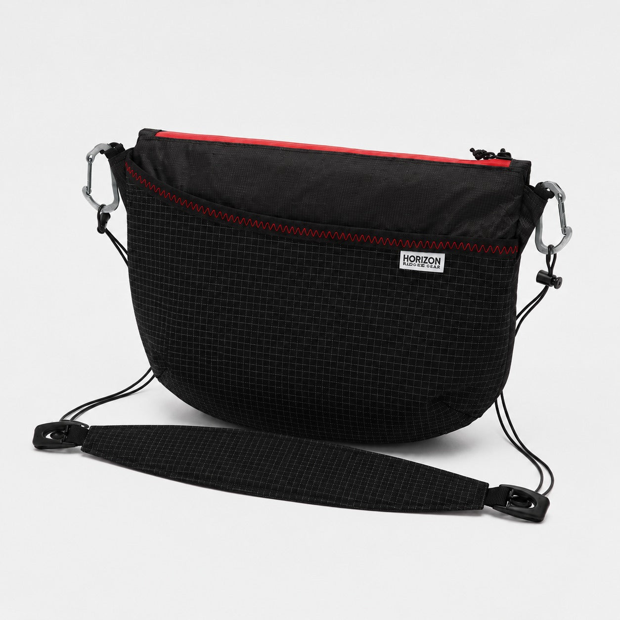 Black Ultra 200 crossbody bag with Dyneema stretch front pocket