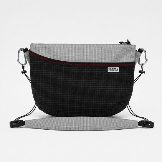 Gray Ultra 200 shoulder bag with red zigzag stitch