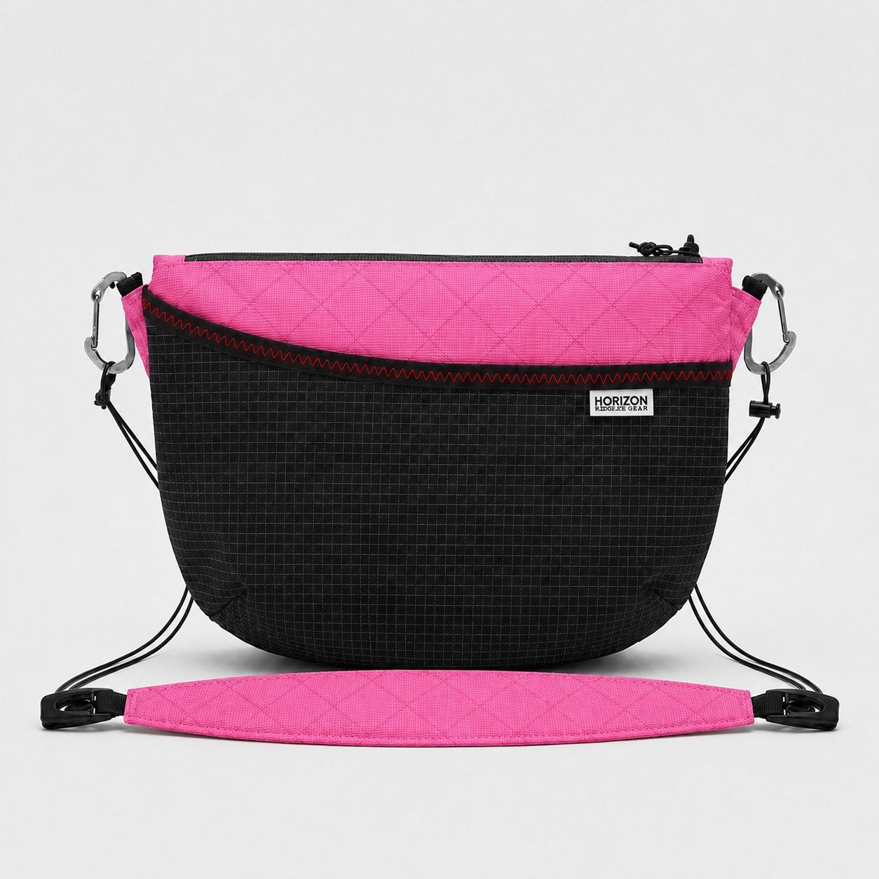 Pink lightweight hiking crossbody bag with Dyneema stretch pocket