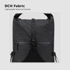 Close-up of black DCH fabric texture on OCE GEAR roll-top hiking backpack