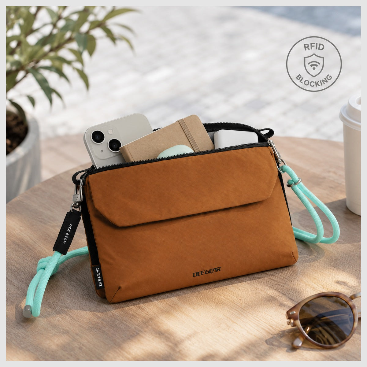 OCE GEAR Trail Orange crossbody organizer bag holding phone and daily essentials