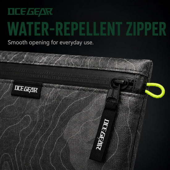 Close-up of OCE GEAR storage pouch black water-repellent zipper and branded pull tab