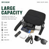 Compact black mini crossbody bag carrying phone wallet cards keys and small essentials