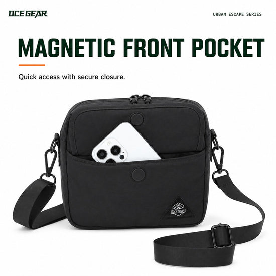 Magnetic front pocket on Black mini crossbody bag holding a phone