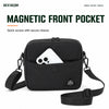 Magnetic front pocket on Black mini crossbody bag holding a phone