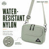 Water-resistant nylon fabric detail on Sage Green mini crossbody bag
