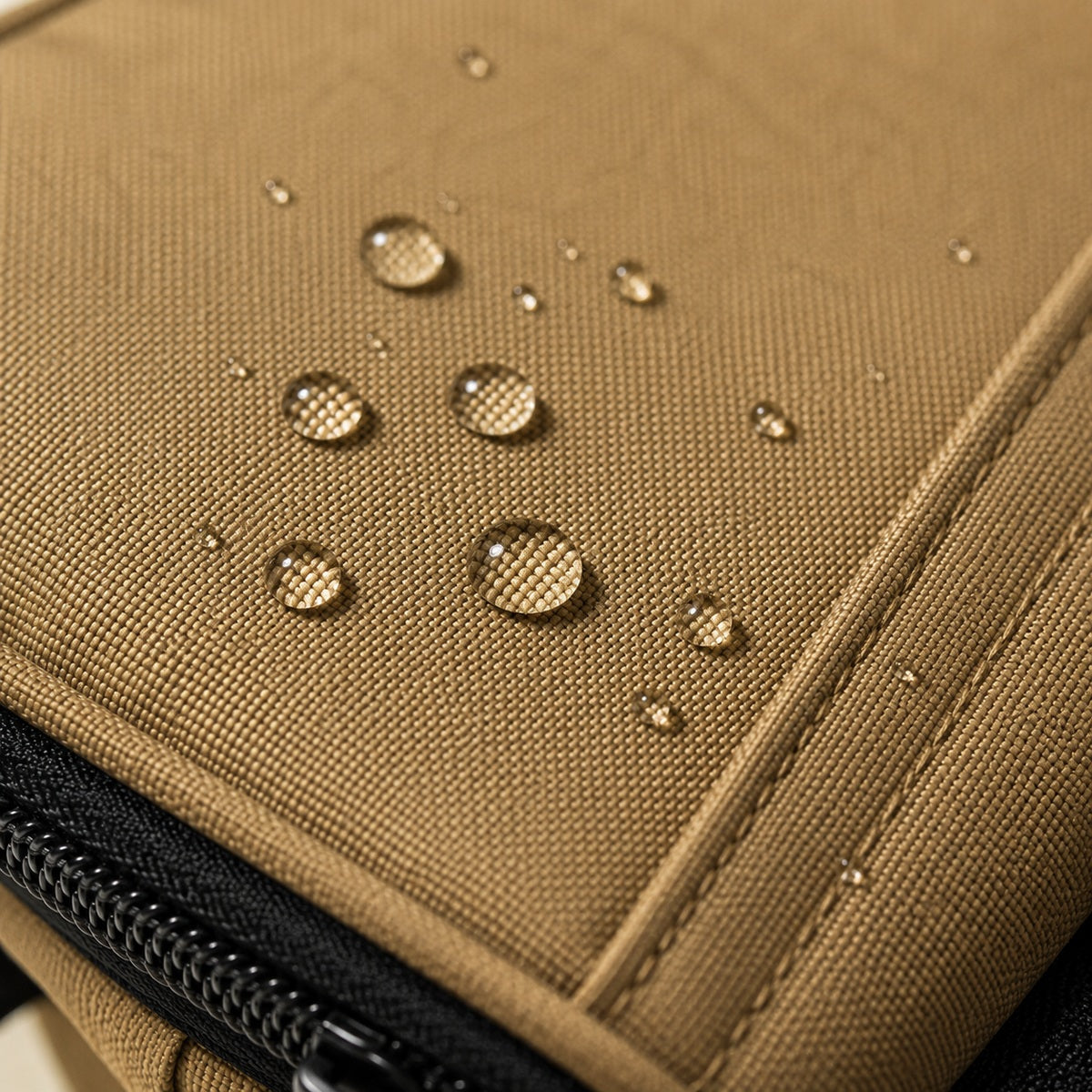 Close-up of water-repellent 1000D khaki fabric with water droplets
