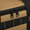 Close-up of dual black zipper pulls on khaki camping organizer bag