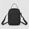 Black outdoor bottle sling bag with rear zip pocket