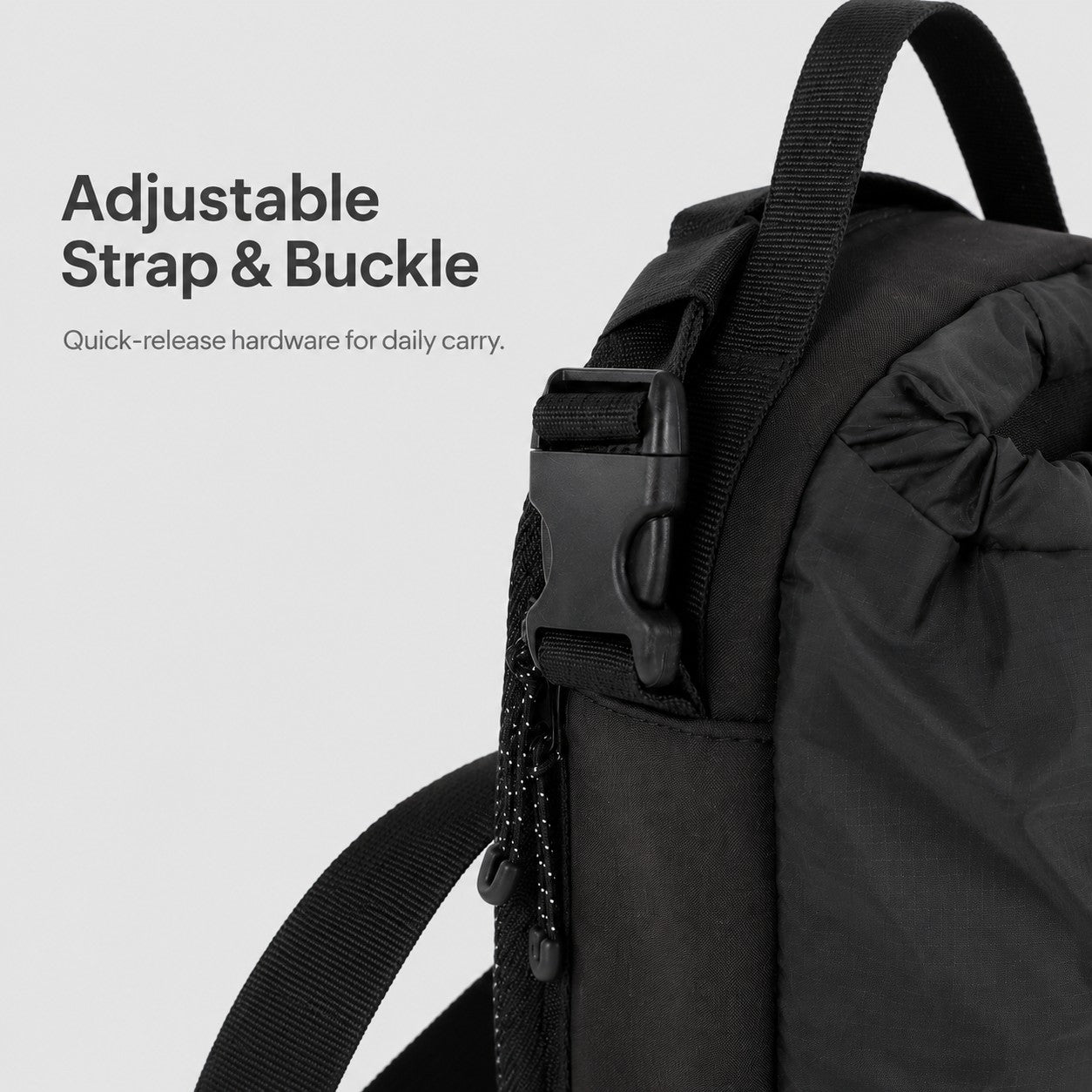 Adjustable strap and quick-release buckle on bottle sling bag