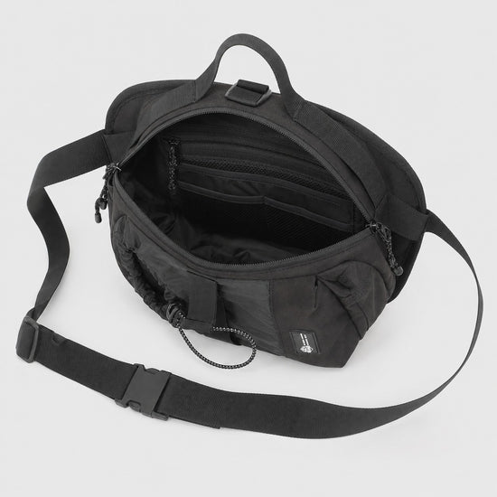 Internal organizer space inside compact bottle sling bag