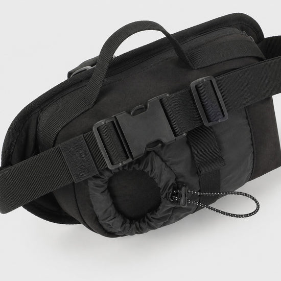 Adjustable strap and quick-release buckle on bottle sling bag