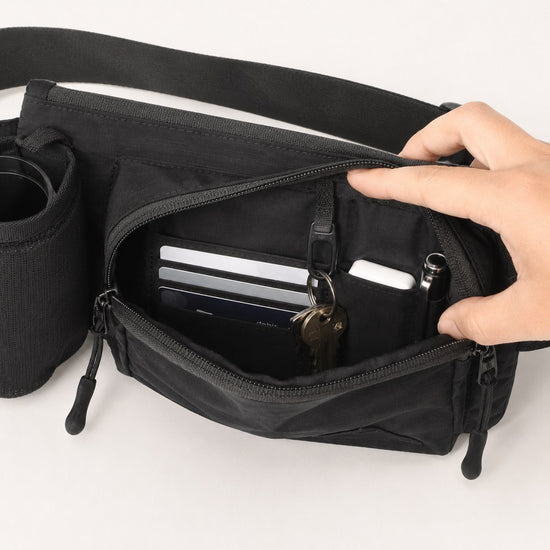Internal card organizer inside water bottle waist bag