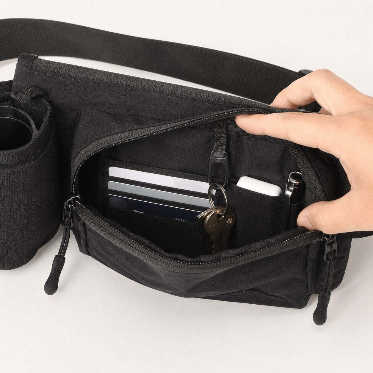 Internal card organizer inside water bottle waist bag