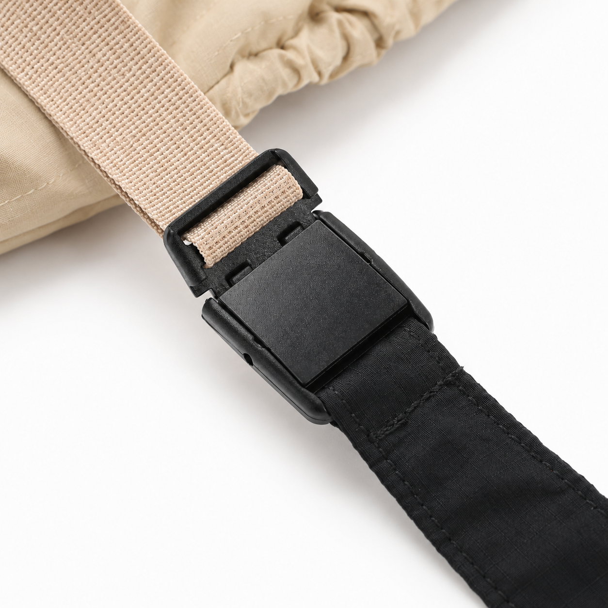 Adjustable strap buckle detail on packable tote bag