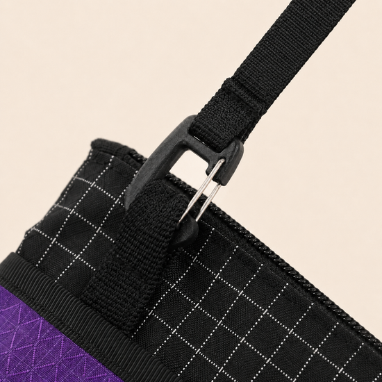 Adjustable detachable strap hardware detail on lightweight sacoche shoulder bag