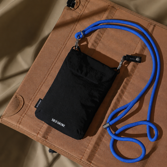 Black RFID travel phone pouch with detachable blue rope strap