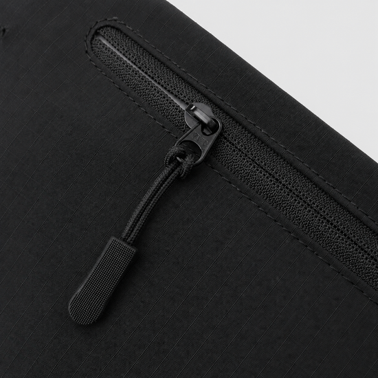 Zipper detail on matte nylon ripstop RFID phone pouch