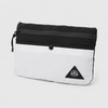 Travel tote bag folded into compact detachable mini pouch