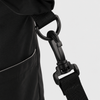Rotating quick release clip detail on packable travel tote bag