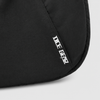 OCE GEAR logo detail on black expandable crescent shoulder bag
