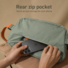 Rear zip pocket on expandable nylon crescent shoulder bag